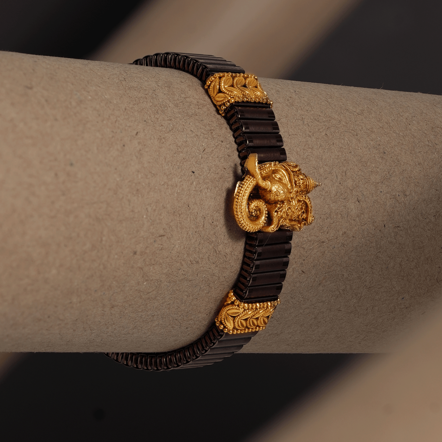 Ganesha Divine Kada with Antique Gold Motif on Rustic Black Band