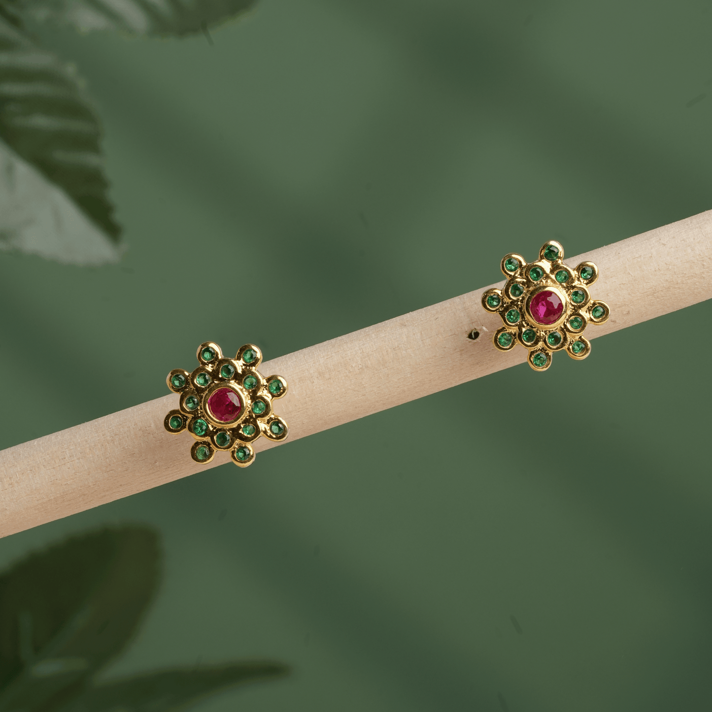 Ruby-Glow Floral Stud