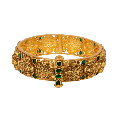 Temple Heritage Gold Bangle with Intricate Lion Motifs and Emerald Accents