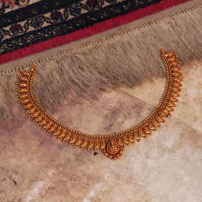 Varnika Lakshmi Kasu Necklace in Antique Gold Finish