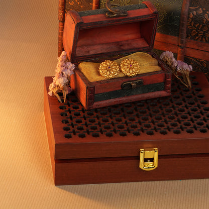 Antique Gold-Finish Pushpa Studs with Ruby Centre and Leaf Filigree