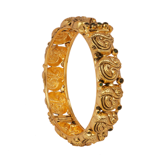 Regal Paisley Gold Bangle with Emerald Accents