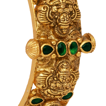 Temple Heritage Gold Bangle with Intricate Lion Motifs and Emerald Accents